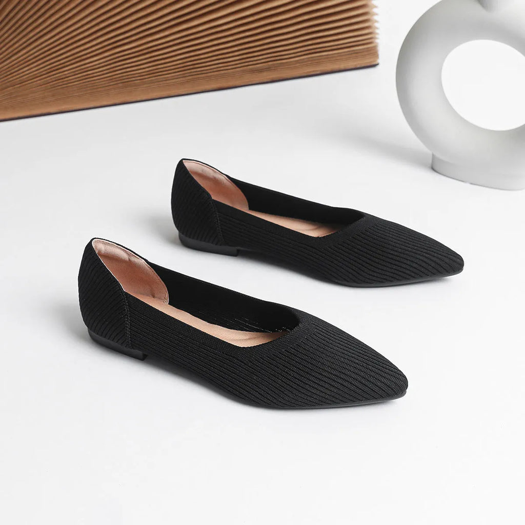 Women's apricot knit pointed toe flat ballet pumps with a rubber sole, shown from the side.