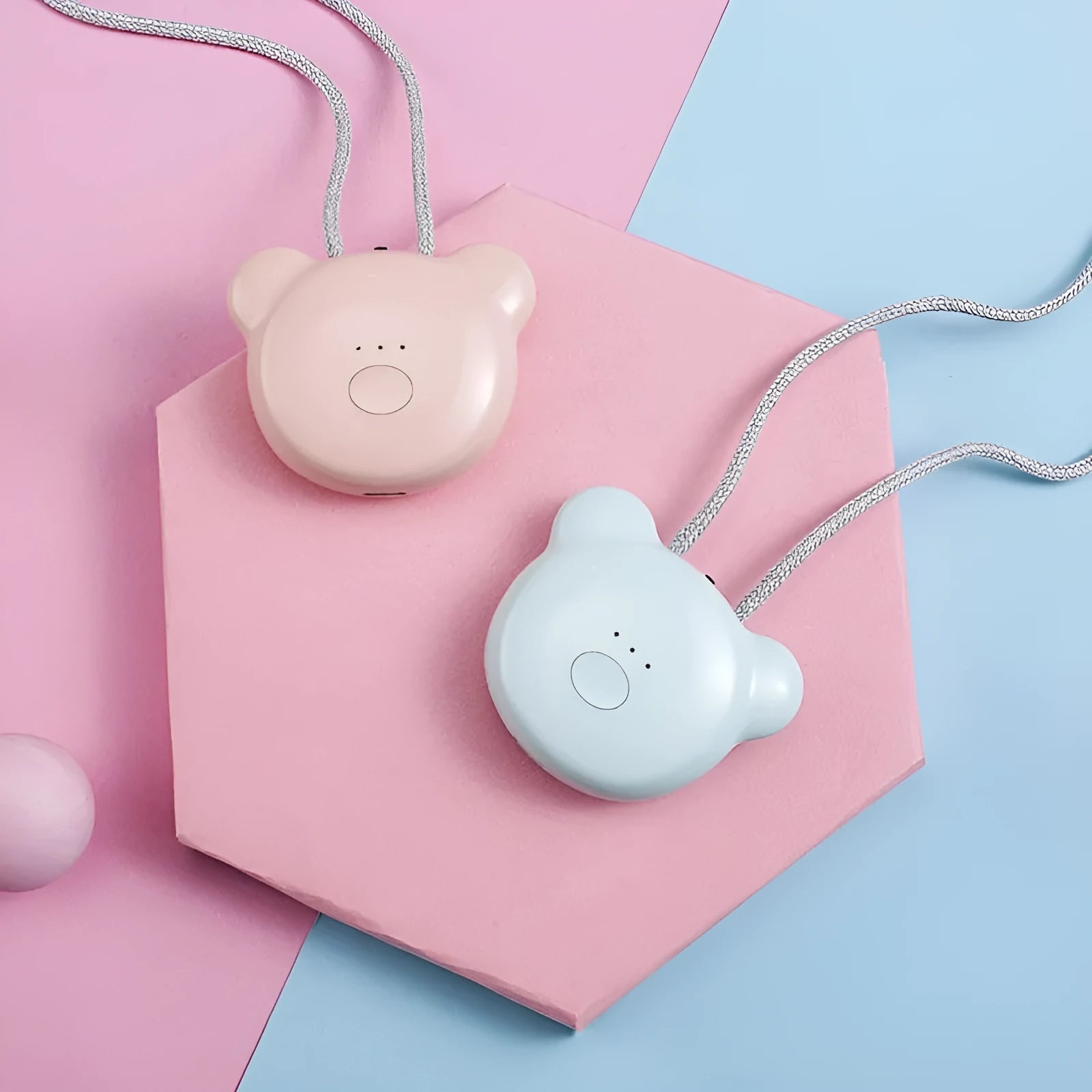 Mini USB rechargeable air purifier necklace in blue, shown with charging cable.