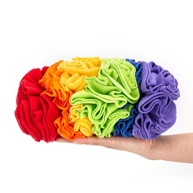 Dog snuffle pad made from polar fleece in rainbow colour, size 25x15cm, with treats hidden in fleece strips