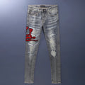 Men's slim fit distressed jeans with hole patches and embroidery in washed-out old colour