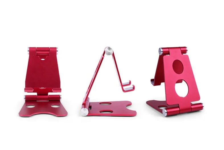 Folding mini mobile phone bracket in black, silver, rose, rose gold or champagne gold, for bed and desktop use.