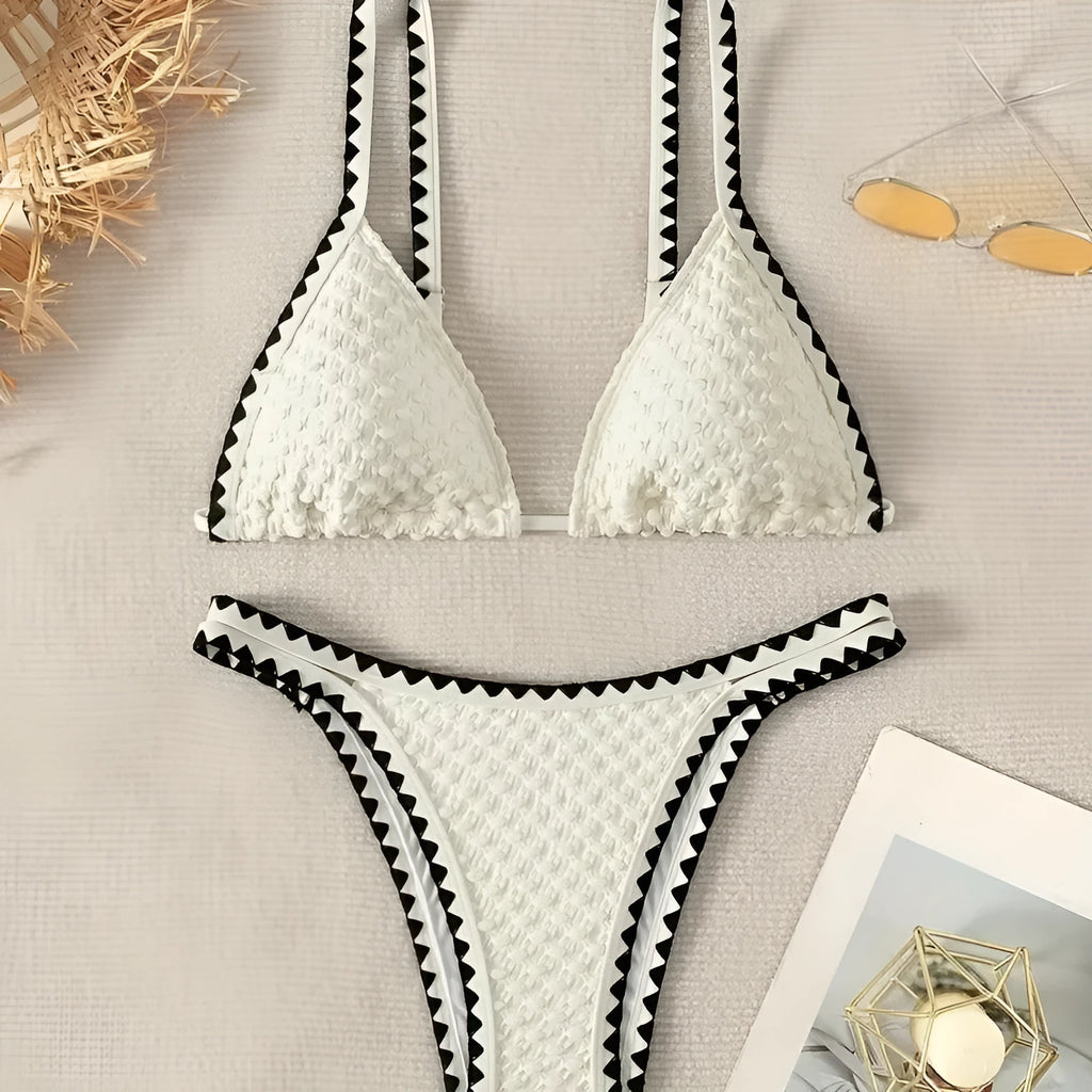 Women's split bikini swimsuit in briefs style available in white or blue colours