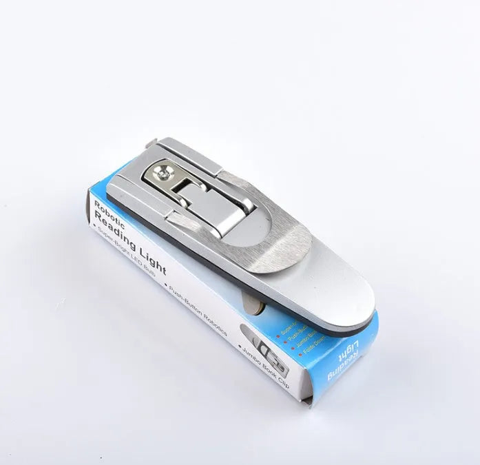 Folding book light in plastic and stainless steel, compact 12cm clip-on reading light for books and e-readers