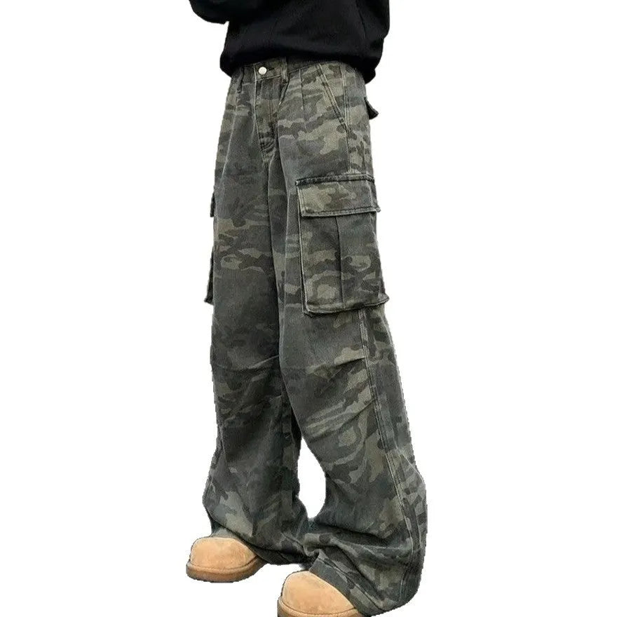 Cotton-blend cargo trousers in a washed camouflage pattern with multiple pockets, shown in colour K0915.