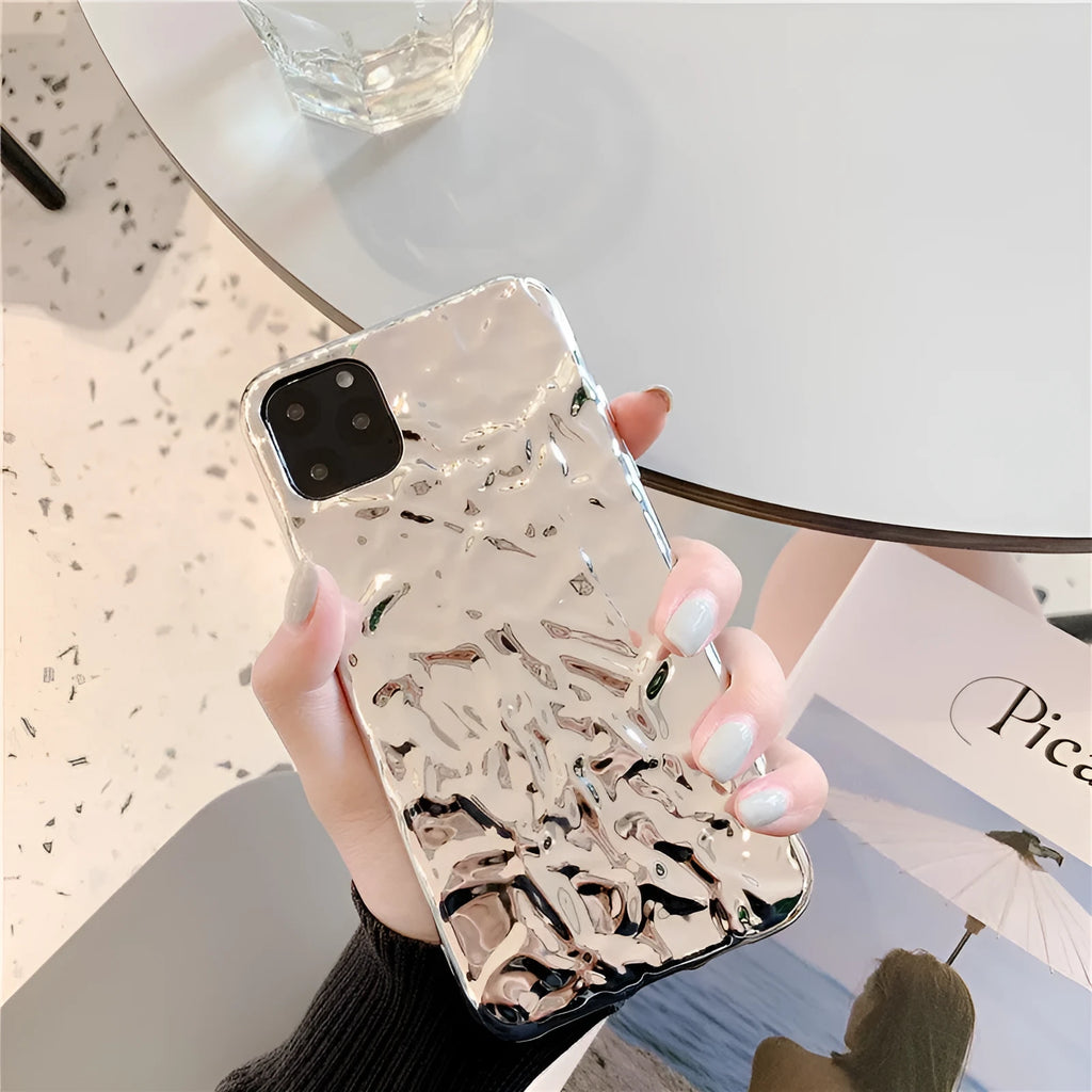 Rose gold electroplated TPU back cover case shown on an iPhone 15 Pro Max.