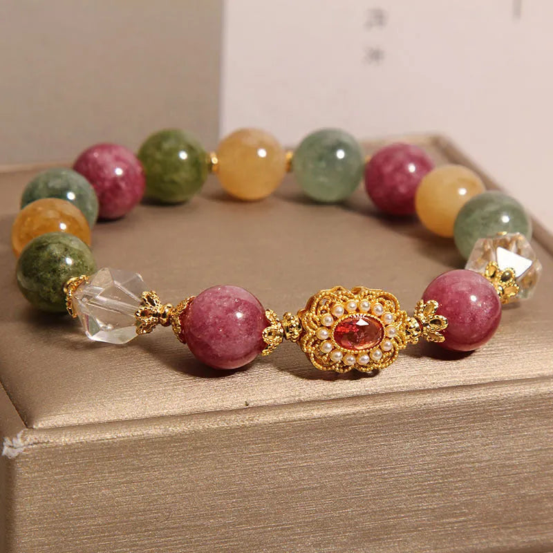 Women's jade colour tourmaline alloy bracelet with round beads on pearl crystal base and rhinestone accents