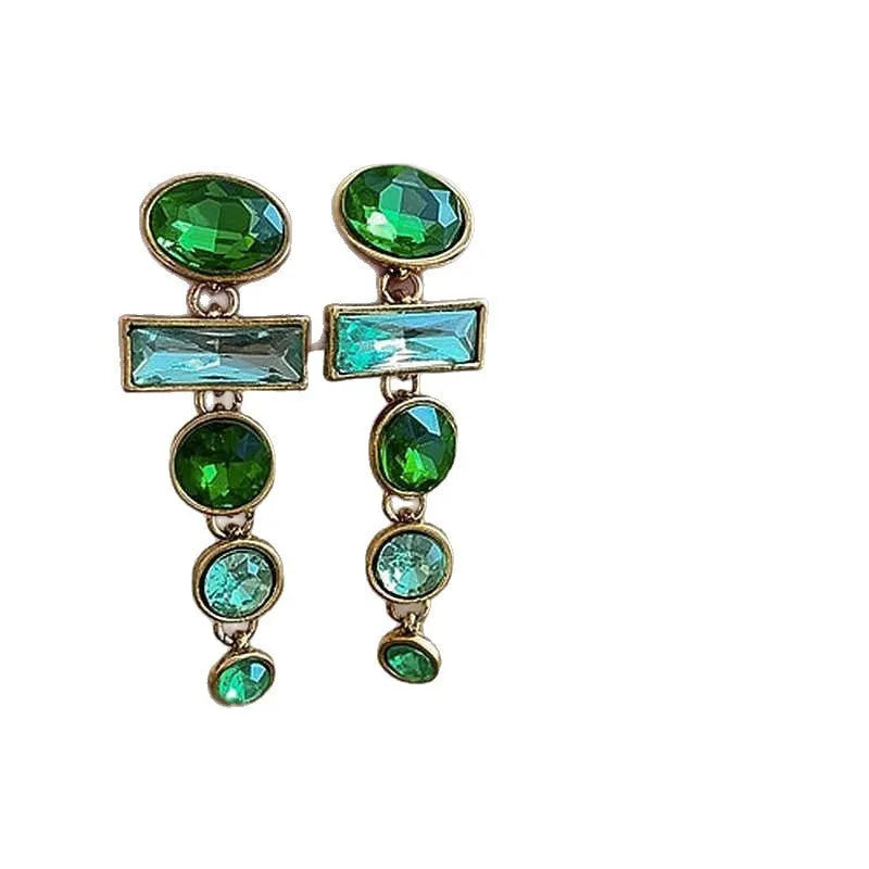 A pair of retro green gradient alloy earrings with geometric Chinese-style design, inlaid zircon stones, and decorative tassels.