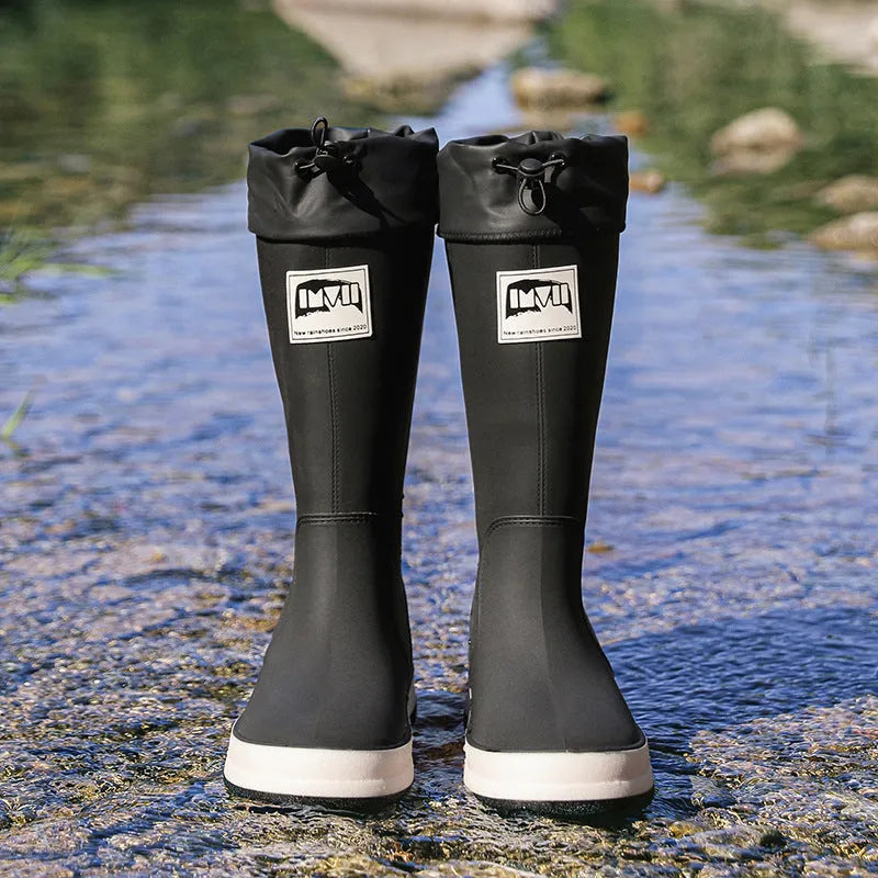 Unisex adult high tube PVC rain boots in solid colour with non-slip sole