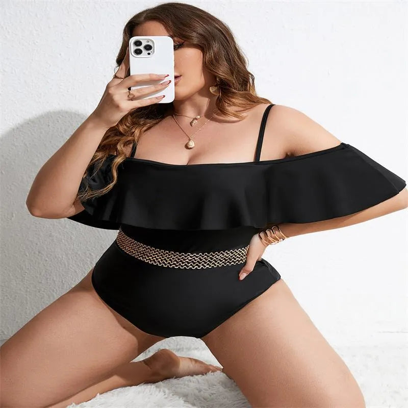Black one-piece swimsuit for women in polyester fabric with extended sizing options