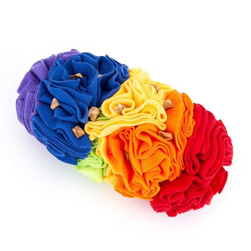 Dog snuffle pad made from polar fleece in rainbow colour, size 25x15cm, with treats hidden in fleece strips