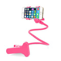 Black flexible long arm phone holder with V-clip extended on a wooden surface
