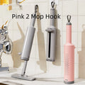 Rotatable self-squeeze flat mop with microfiber pads in grey, pink, or white.