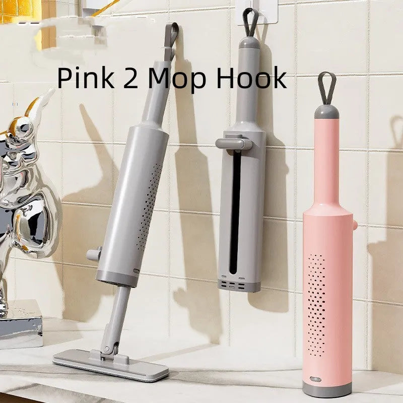 Rotatable self-squeeze flat mop with microfiber pads in grey, pink, or white.
