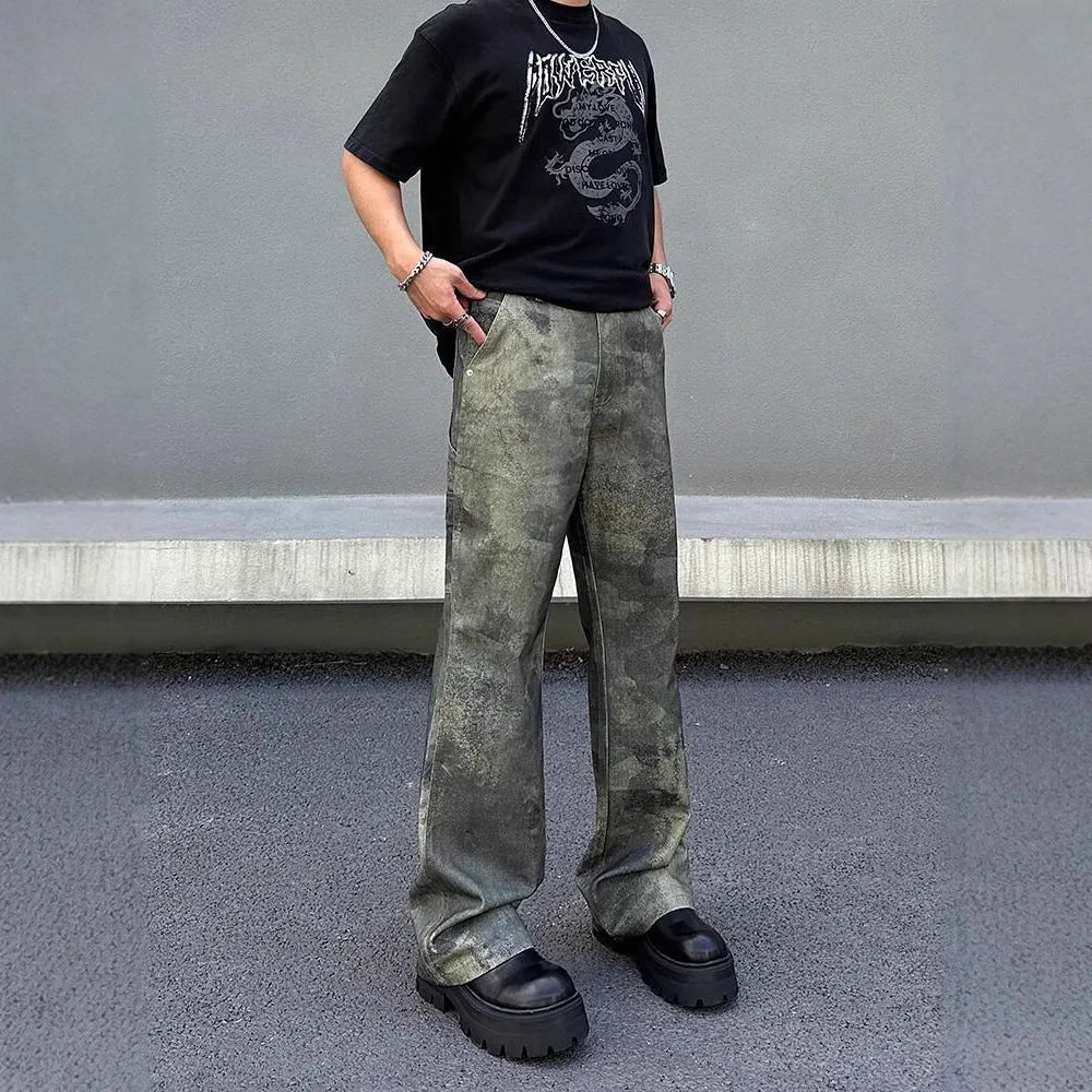 Men's straight leg jeans with a retro digital camouflage print on blue denim.