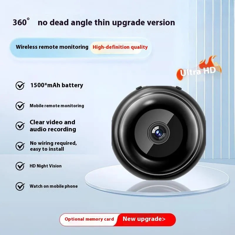 A compact, circular wireless wifi security camera with a 360-degree lens on a table.