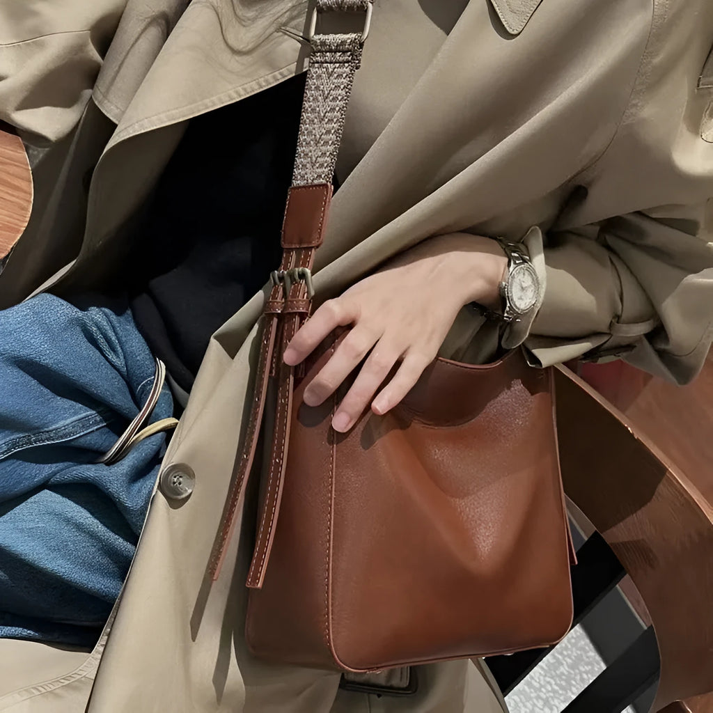 Women's genuine leather messenger bag in square vertical design with shoulder strap