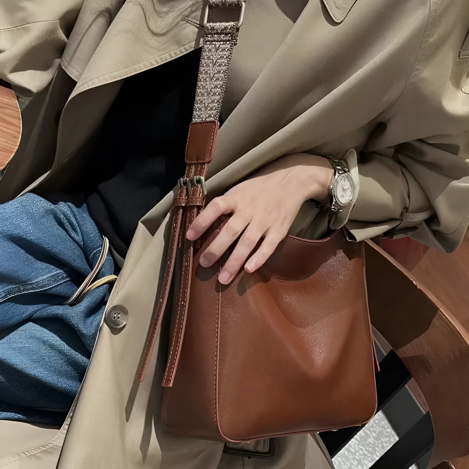 Women's genuine leather messenger bag in square vertical design with shoulder strap