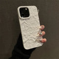 Tin foil pleated silicone phone case for Apple iPhone showing embossed texture