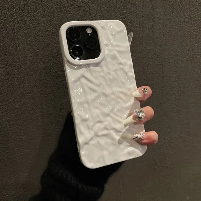 Tin foil pleated silicone phone case for Apple iPhone showing embossed texture