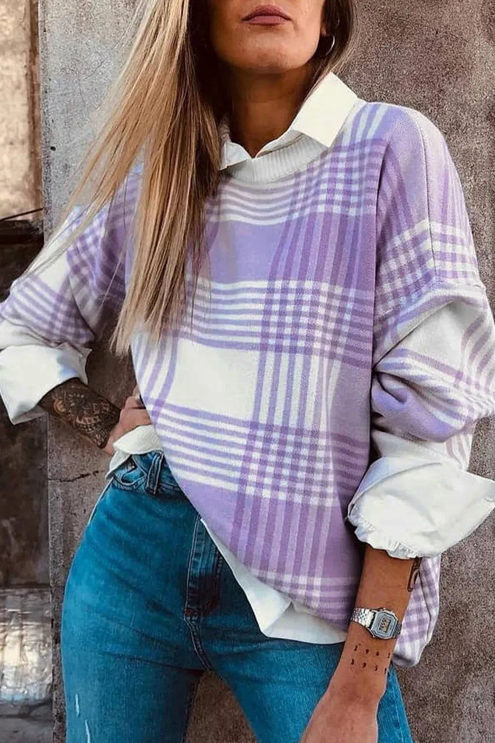 Lilac plaid print loose sweater with long sleeves and ribbed cuffs.