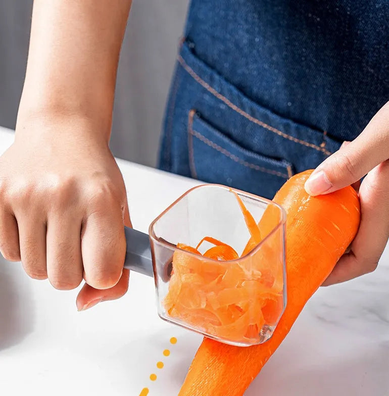A stainless steel single-head kitchen peeler with a coloured PP plastic handle.