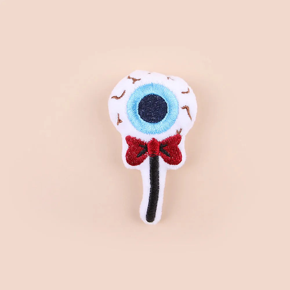 Plush cat teaser wand with colourful candy design on small wand for indoor pet play