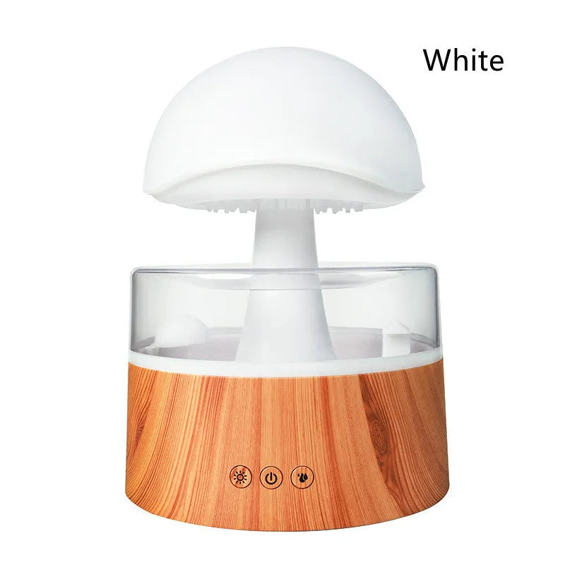 White cloud-shaped humidifier and aroma diffuser with LED lights and simulated raindrops.