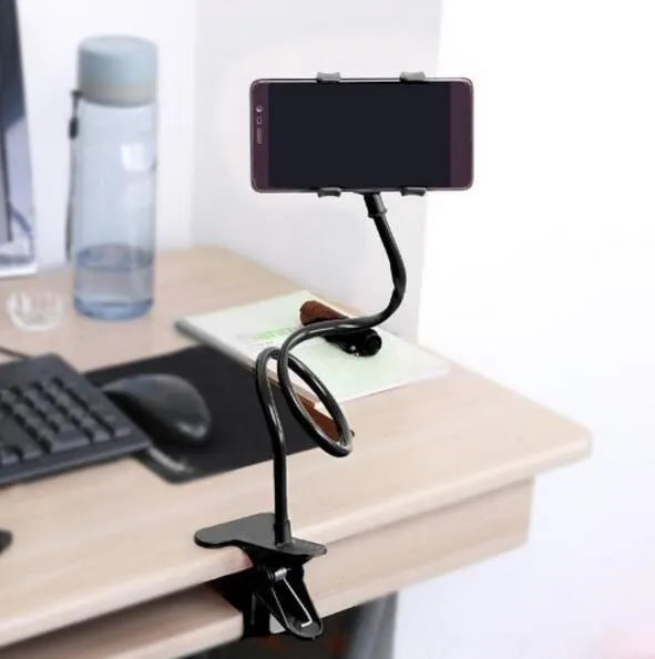 Black flexible long arm phone holder with V-clip extended on a wooden surface