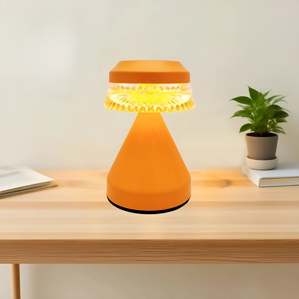 Black USB rechargeable LED bedside lamp with electrodeless dimming controls on a wooden nightstand.