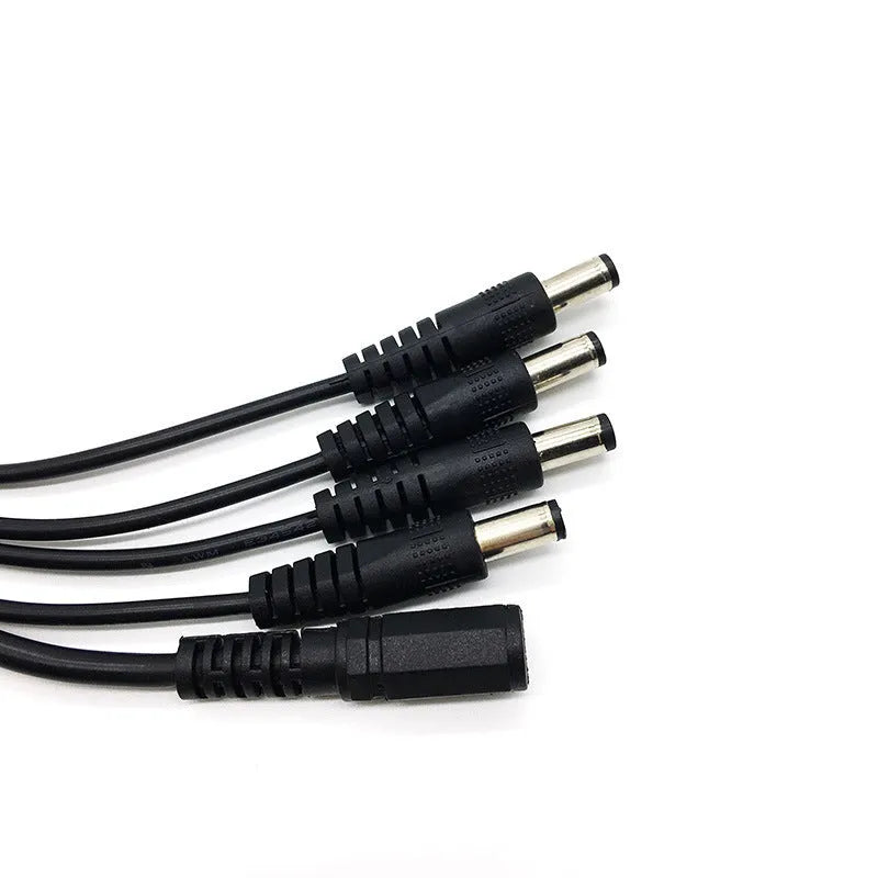 Black 12V DC one-to-four monitoring power splitter cable with 5.5mm connectors for CCTV cameras