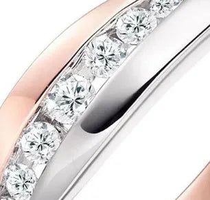 Women's simple two-tone rose gold-plated alloy ring with flower-shaped artificial gemstone inlay on white background