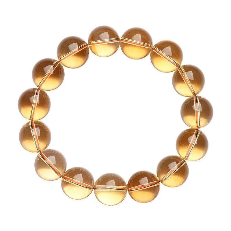Natural citrine scattered bead bracelet in 7A grade on a wrist, showing polished stones and original design.