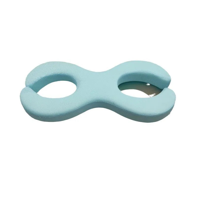 Blue memory foam cervical pillow with cylindrical traction design for neck support