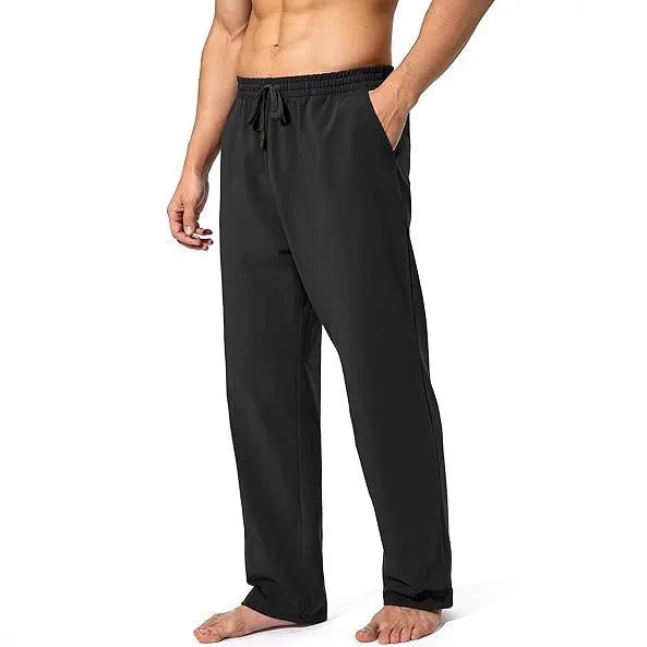Men's loose fit casual trousers in quick-drying polyester fabric available in multiple colours