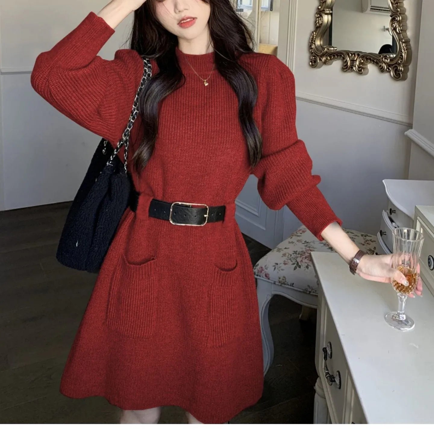 Women's long sleeve loose knitted dress with high waist and black belt in polyester fabric