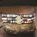 Hand-woven Tree of Life unisex bracelet in brown and white made from mixed natural stone