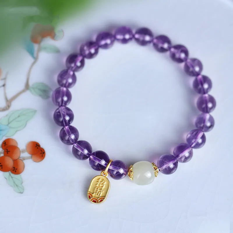 Women's amethyst bracelet with 8mm crystal beads in a geometric, national style design.