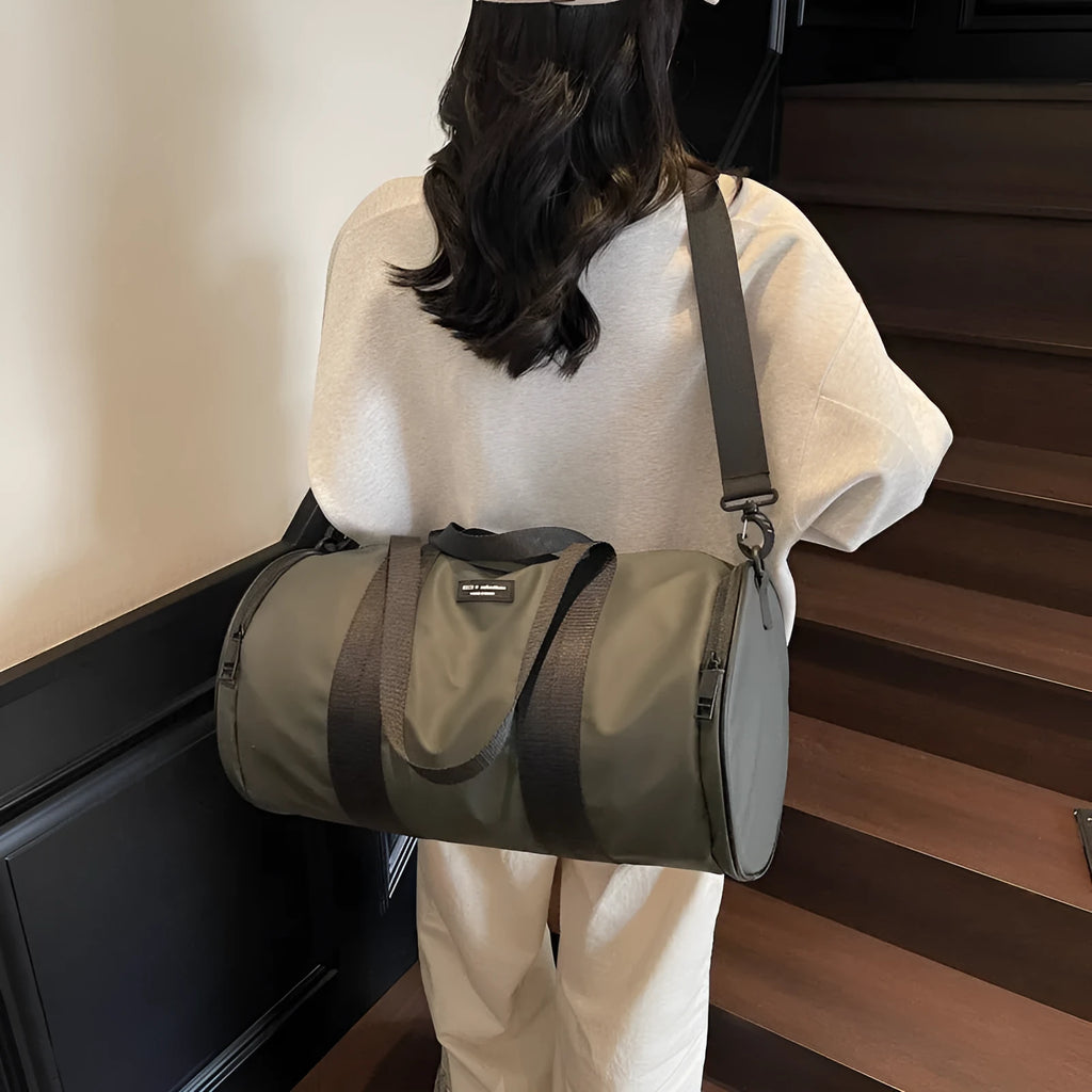 Waterproof Oxford cloth sports handbag in black, dark gold, and dark grey colour options