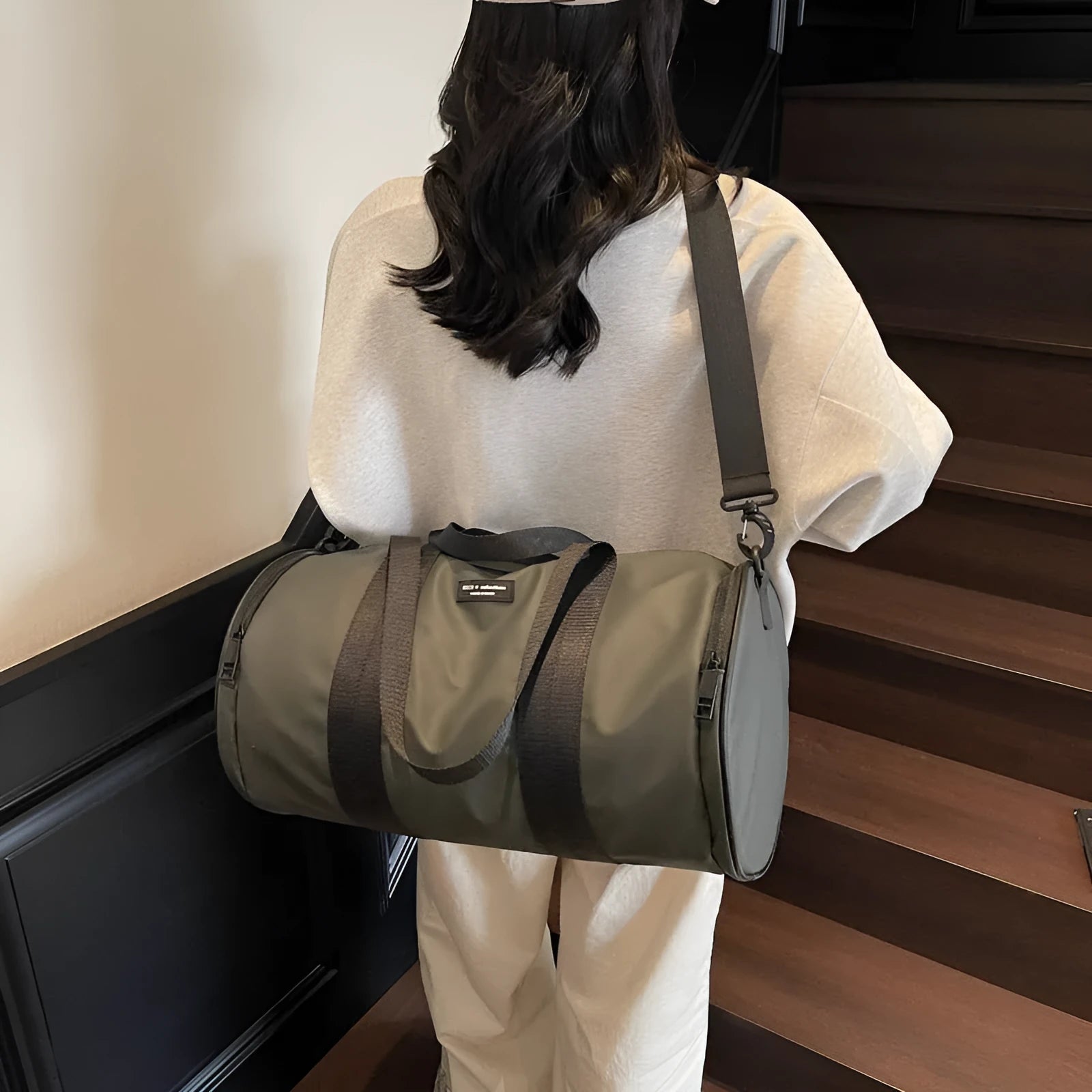 Waterproof Oxford cloth sports handbag in black, dark gold, and dark grey colour options