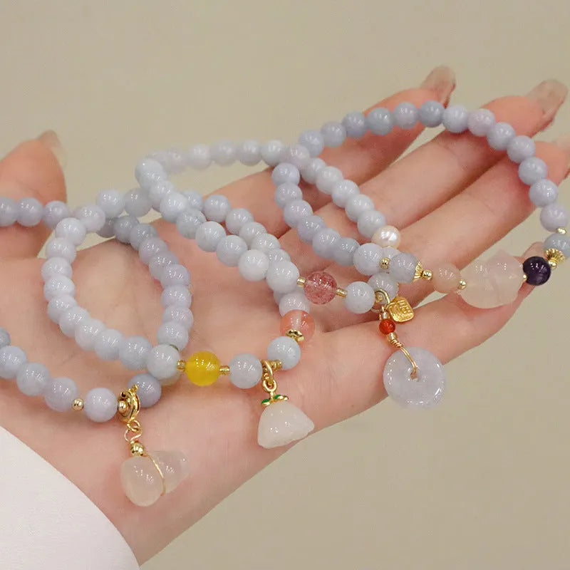 Women's aquamarine artificial crystal bracelet with gold-plated chalcedony pendant in floral design