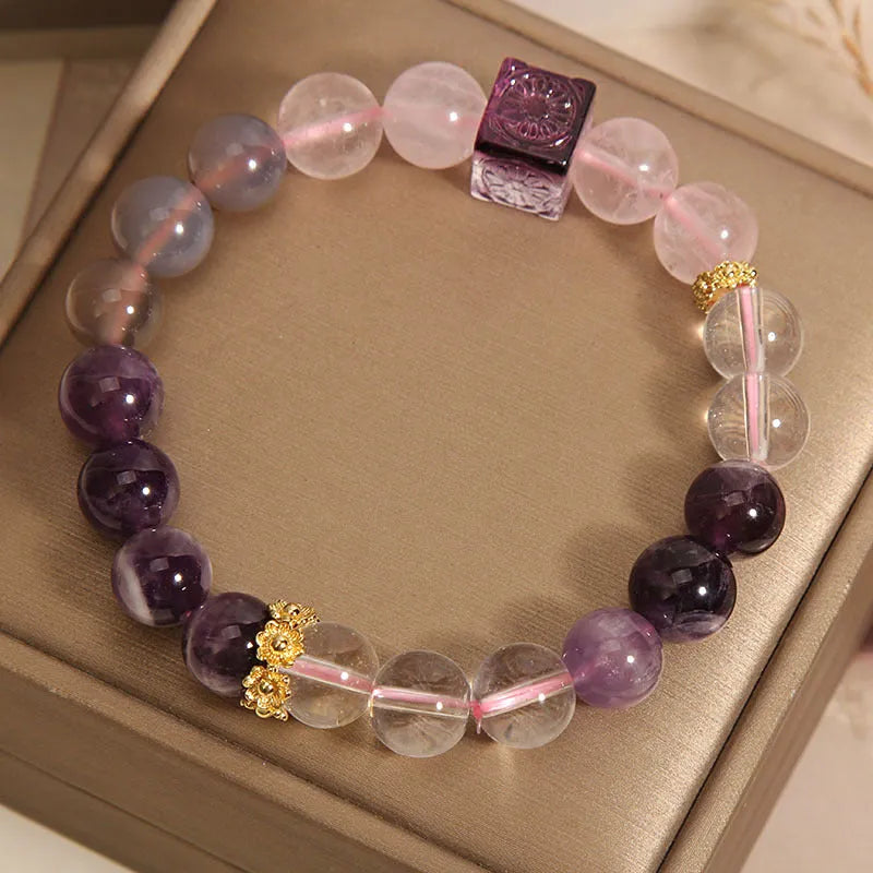 Close-up of a women's purple crystal amethyst bracelet with rhinestones, showing its 10mm size.