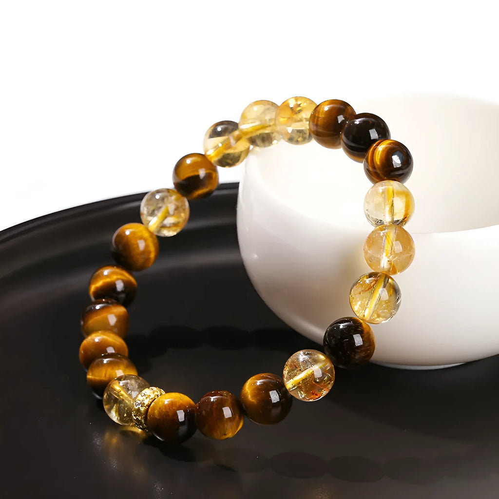 Yellow tiger-eye gemstone bracelet with 8mm round beads in a Jinba geometry design.