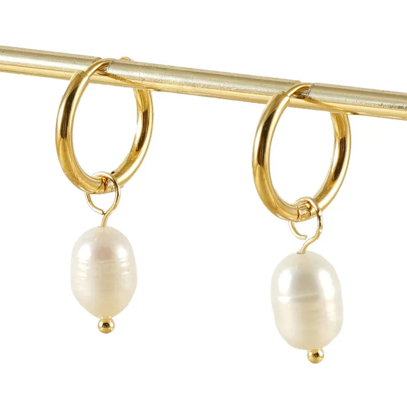 Gold coloured geometric women's earrings with a freshwater pearl, made from stainless steel and titanium steel.