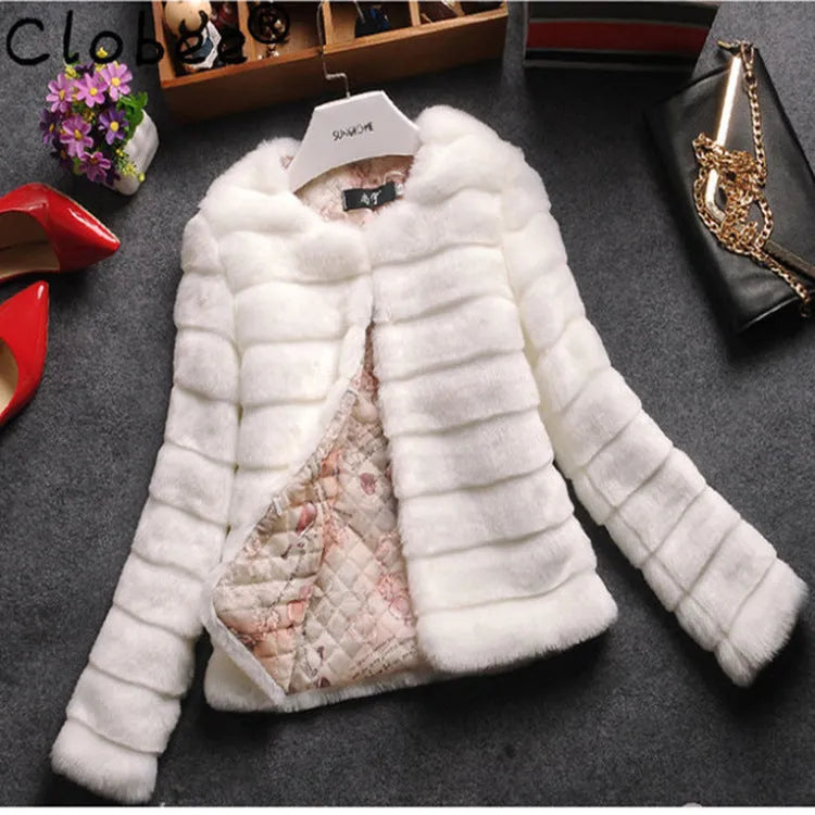 Women's short sleeve faux fur top in beige, shown on a model.