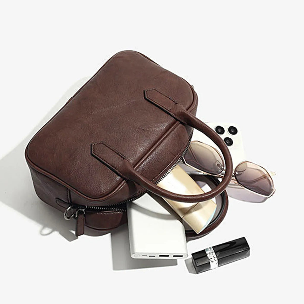 Retro horizontal square black PU leather messenger bag with a single shoulder strap