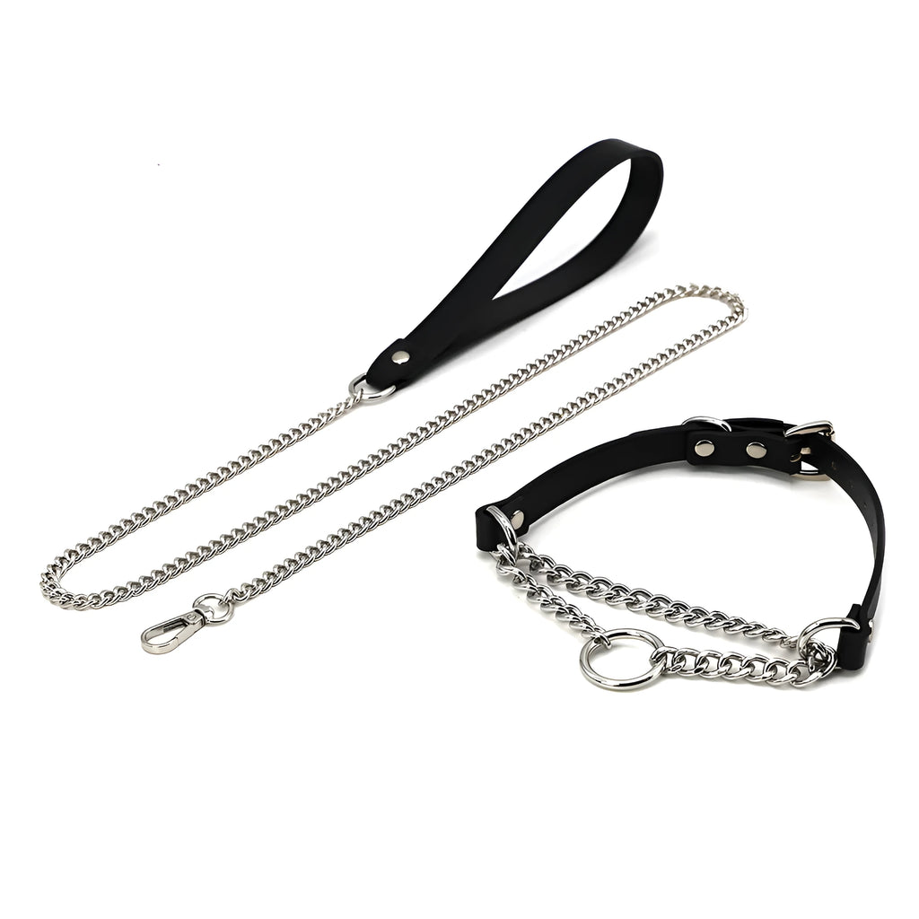 Black leather dog collar with chain tightening mechanism and matching leash on dark background
