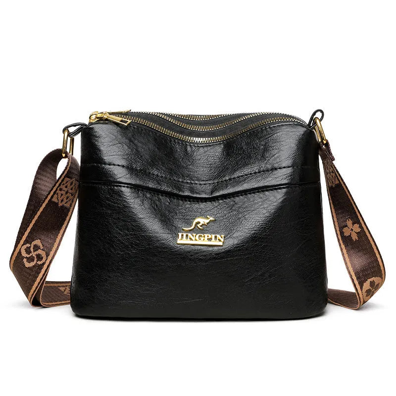 Large capacity cross body messenger bag in PU leather with crocodile pattern finish and multiple compartments