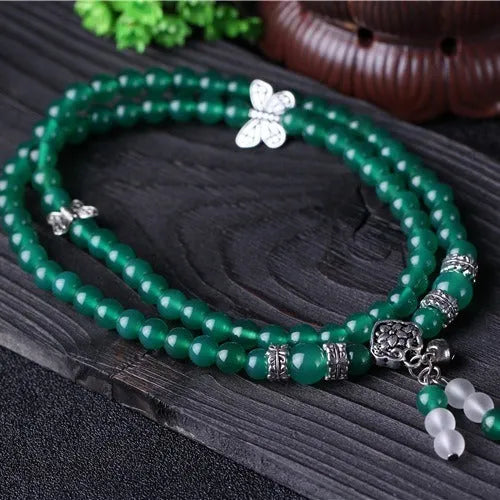 Green agate multi-layer bracelet with 6mm beads and three-circle chain design.