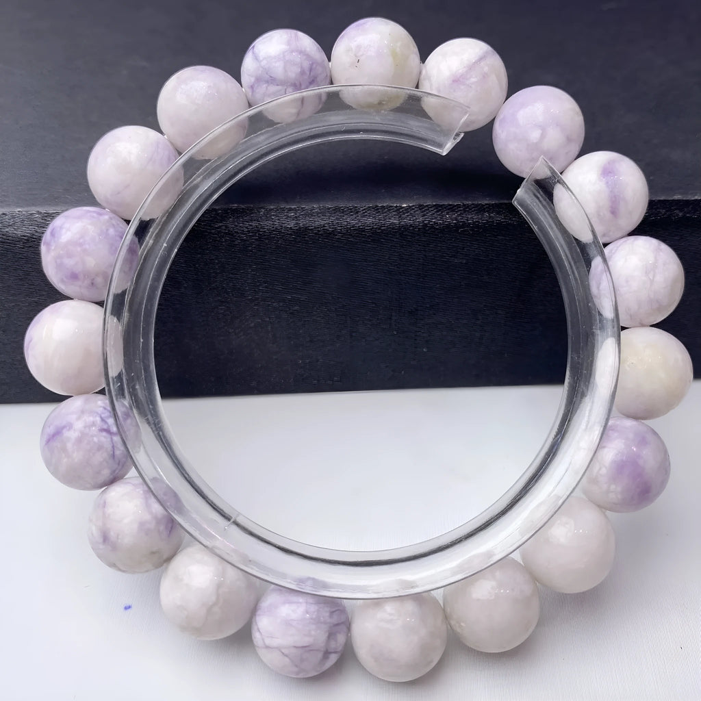 Natural purple turquoise beaded bracelet for women, showing stone colour variation.