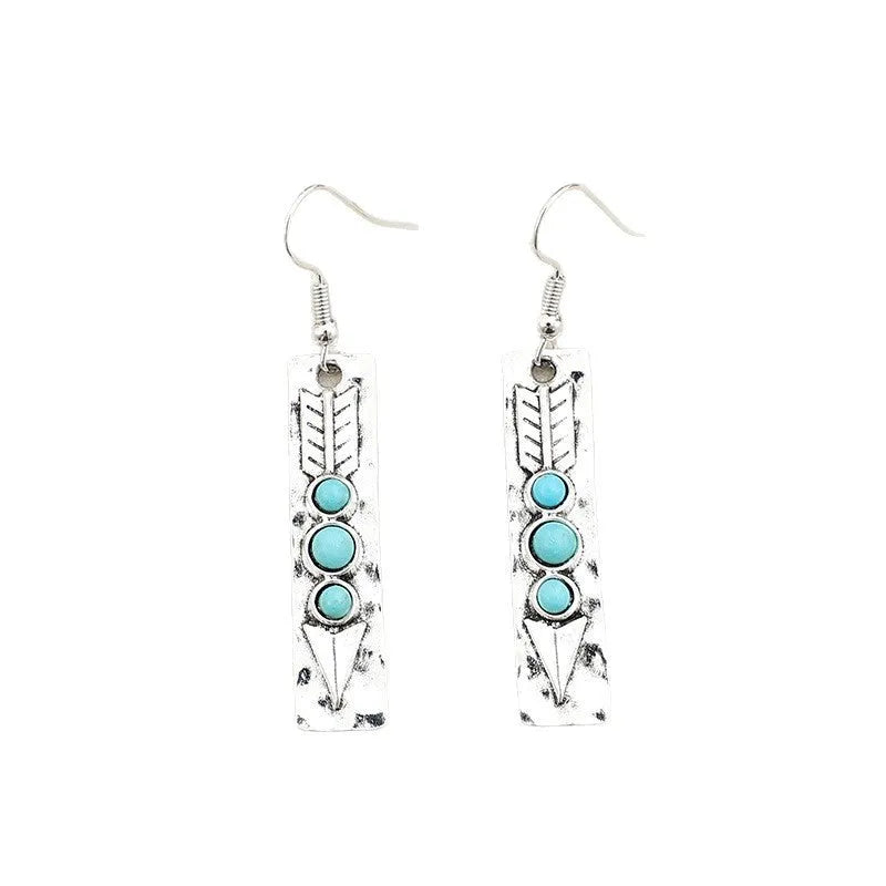 Silver geometric retro earrings with inlaid turquoise detail on zinc alloy